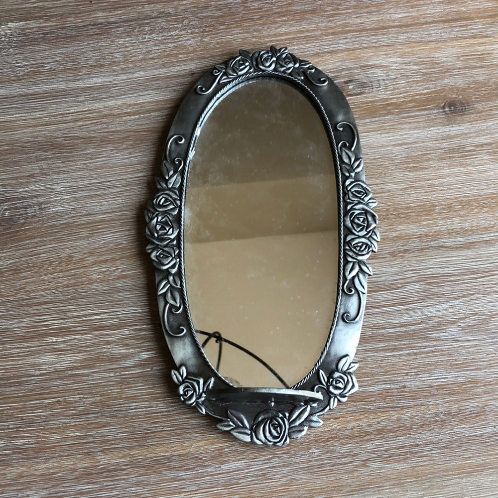 Small mirror with holder